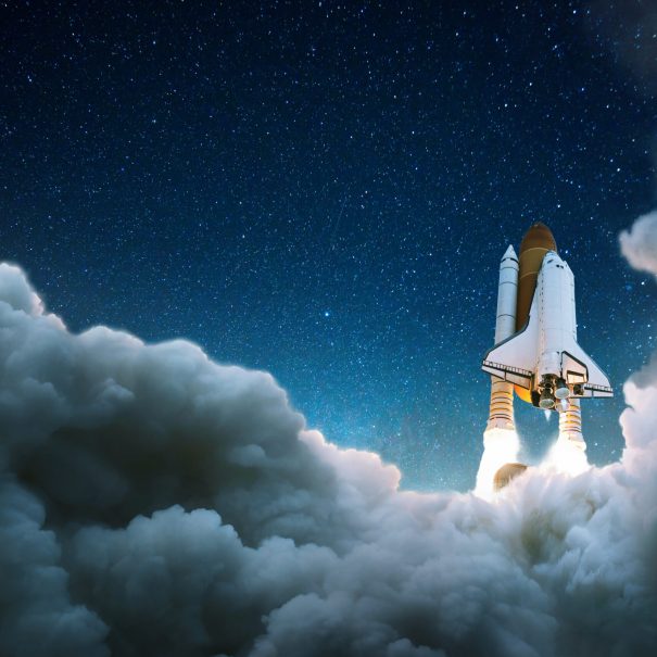 Rocket taking off at night